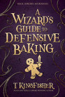 A Wizard’s Guide to Defensive Baking. Obálka prvého vydania (Red Wombat Studio, 2020).